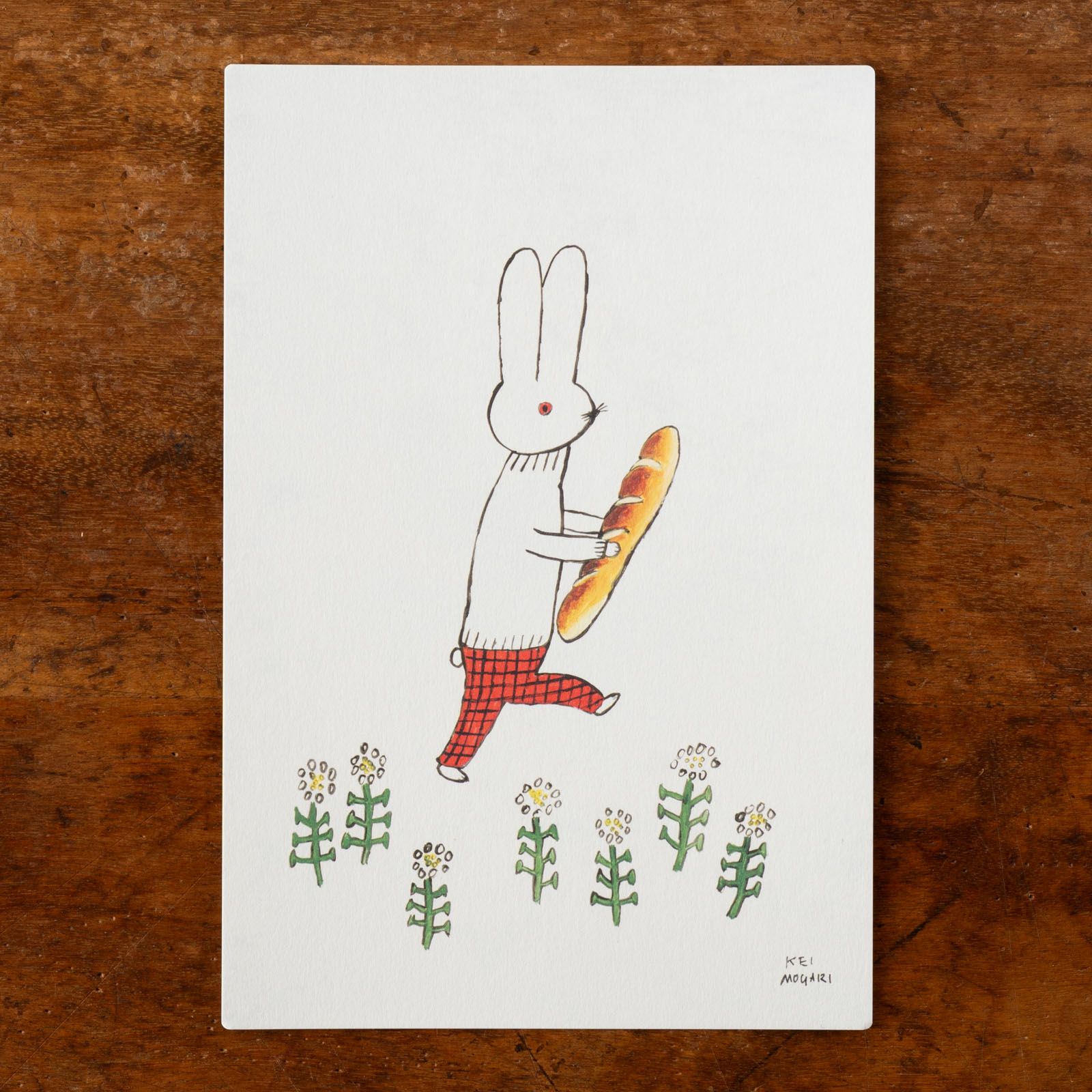 うさぎがフランスパンを持っているデザイン